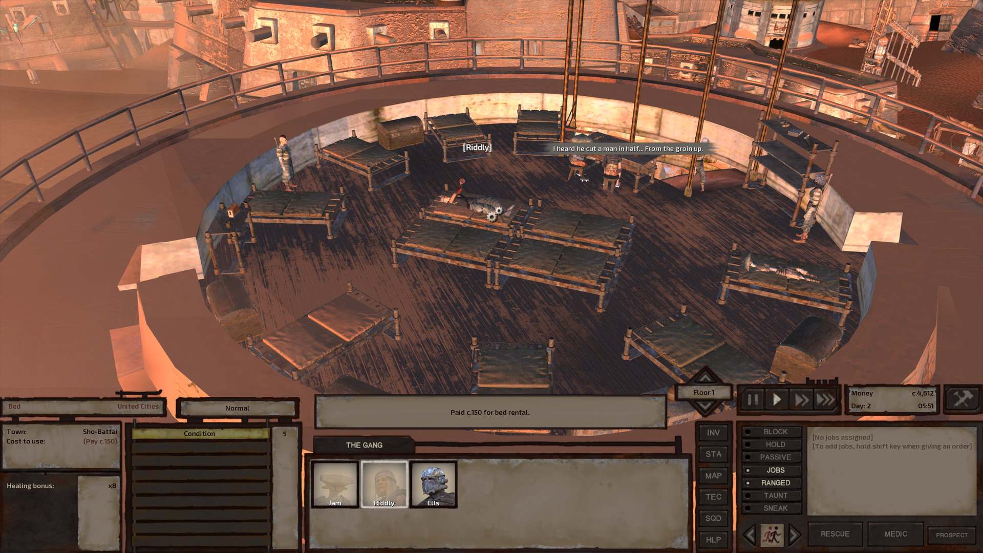 Riddly lies in a bed in the middle of a circular room. The room has 12 beds in total and absolutely zero privacy, with a couple people hanging out at a table overlooking the stairs and a pair of guards staring directly into the room.
