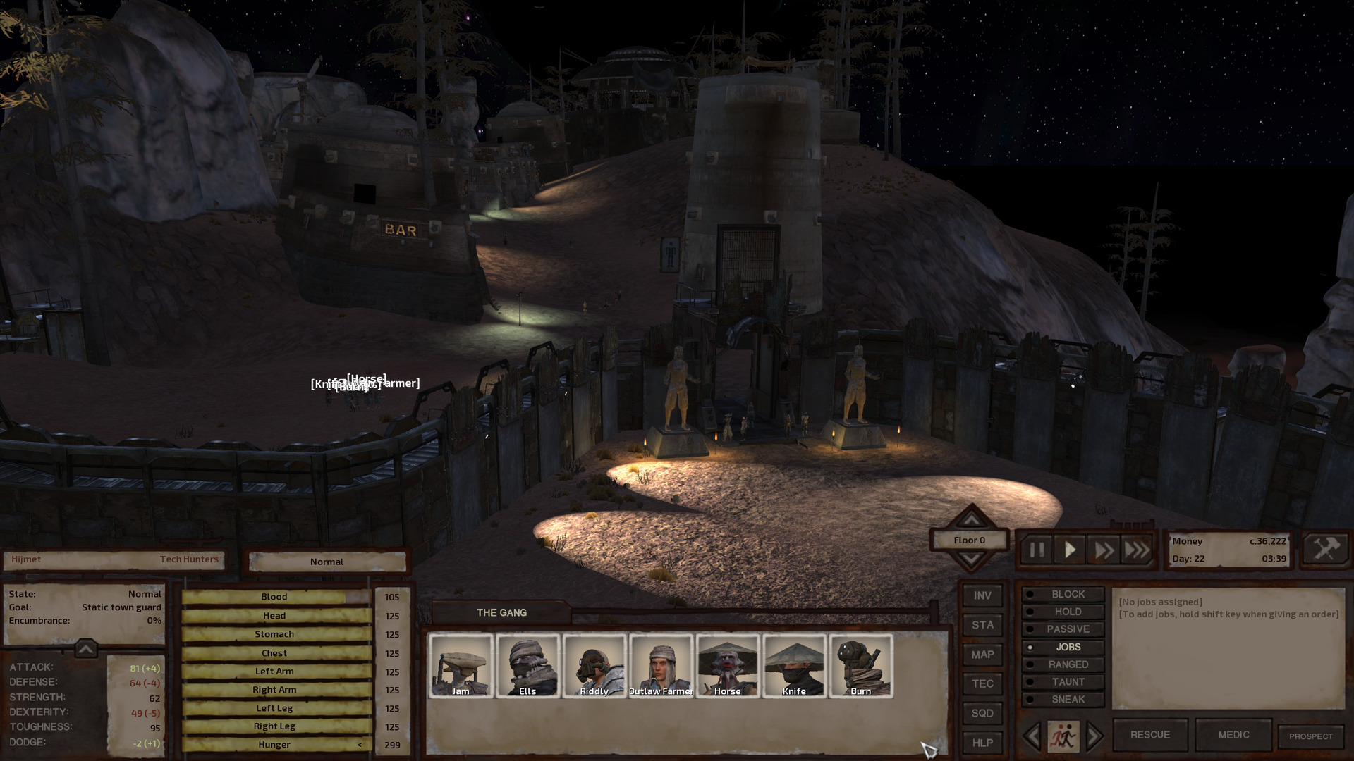 Spotlights illuminate the path to World's End. The front gate is flanked by statues of what looks like a Holy Nation paladin with his hands held in front of him, palms up. A group of tech hunters stand guard. Behind the thick walls sit a large bar, a headgear shop in a watchtower, and various other buildings in the distance. Interspersed between the buildings are tall coniferous trees with sparse branches—lodgepole pines perhaps.