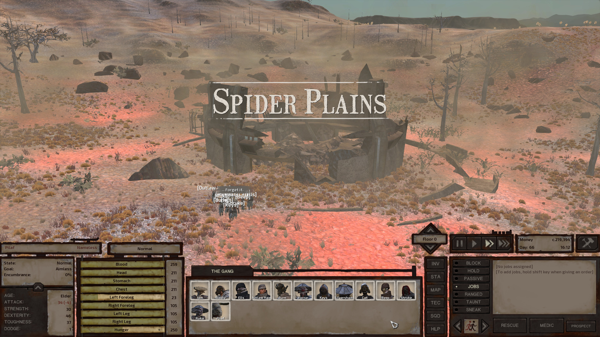 The gang stands in front of what probably used to be an ancient lab, now a pile of rubble between still-standing chunks of wall, half-buried in the sand. A sandstorm rages around them. The environment here is patchy scrubland on gentle hills, with boulders scattered across the plain.