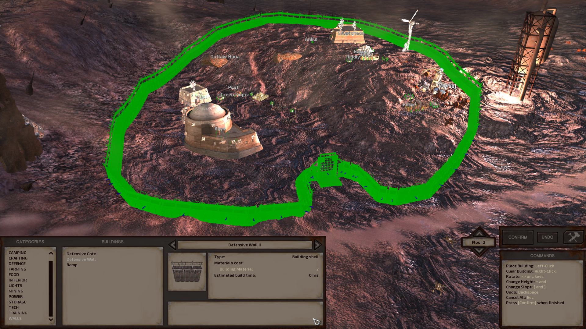 A zoomed-out shot of the entire base, the wall now forming a ring around it. The wall and gate are still bright green since we are still in the build menu.